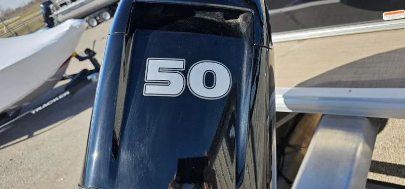 Slide: The Image of 2025 Sun Tracker Party Barge 16 DLX with 50 HP engine, close-up view. - 46