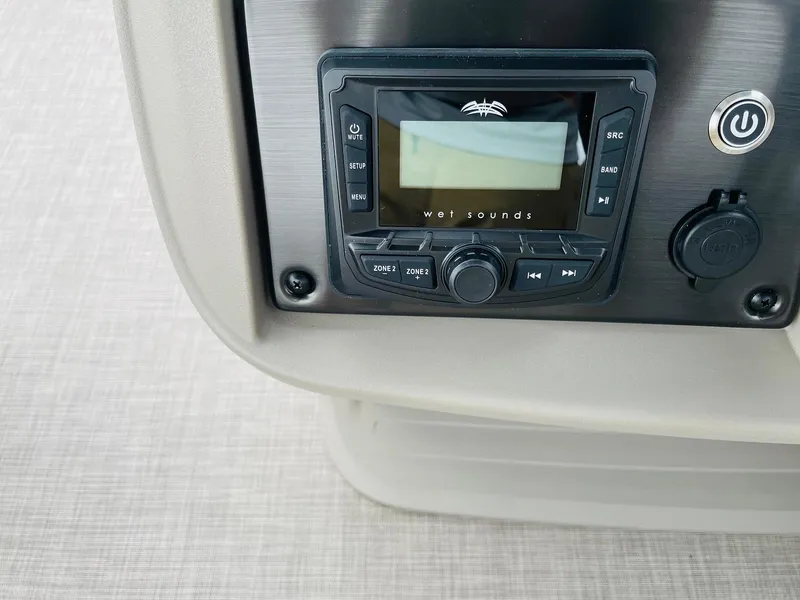 Slide: The Image of 2025 Sun Tracker SportFish 20 DLX audio system with Wet Sounds control panel. - 25