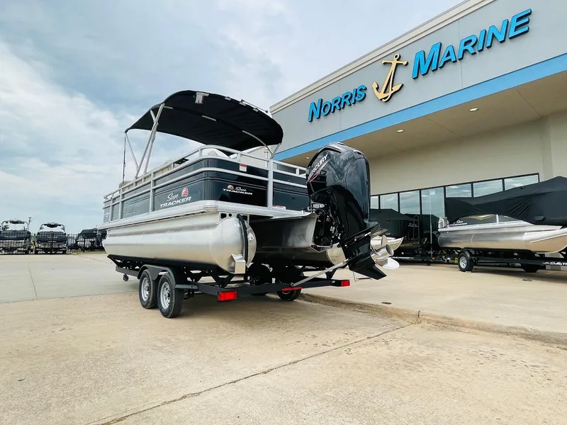 Slide: The Image of 2025 Sun Tracker SportFish 20 DLX pontoon boat at Norris Marine dealership. - 7