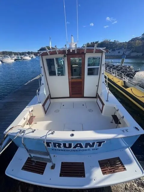 Slide: The Image of 1989 Blue Seas Out Island Explorer boat docked, Kennebunkport, ME. - 2