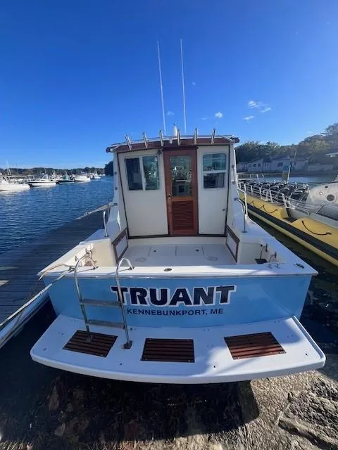 Slide: The Image of 1989 Blue Seas Out Island Explorer boat docked in Kennebunkport, ME. - 3