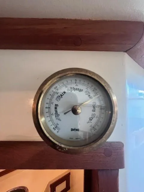 Slide: The Image of Vintage barometer on 1989 Blue Seas Out Island Explorer yacht interior. - 34