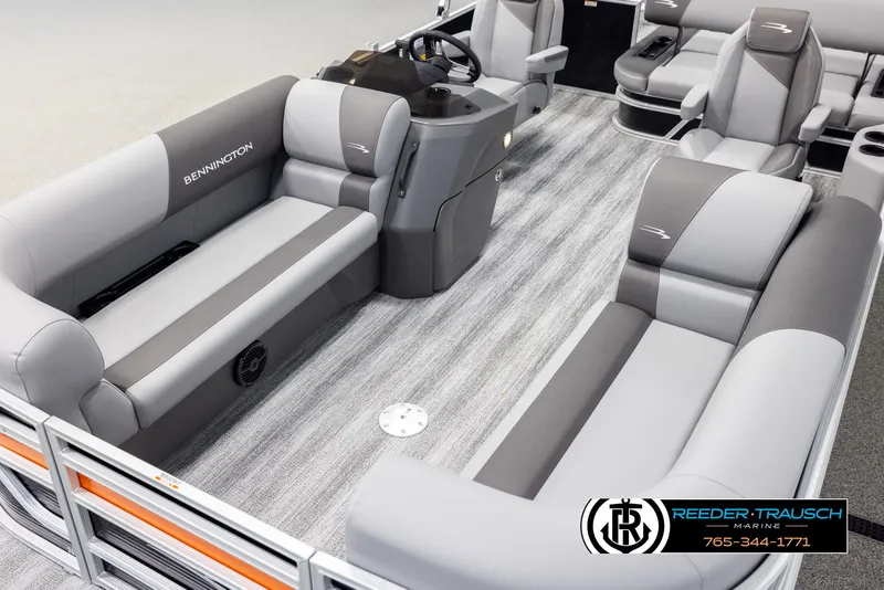 Slide: The Image of 2025 Bennington 21 SSBSE pontoon boat interior with gray seating and modern design. - 10
