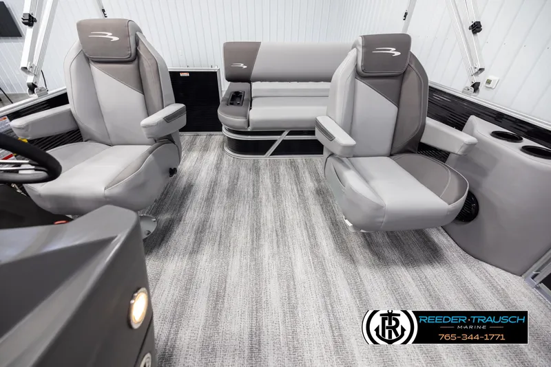 Slide: The Image of 2025 Bennington 21 SSBSE boat interior with gray seating and carpeted flooring. - 14