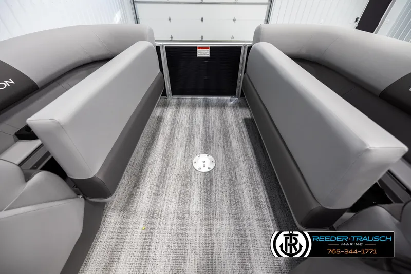 Slide: The Image of 2025 Bennington 21 SSBSE pontoon boat interior with gray seating and carpeted flooring. - 19