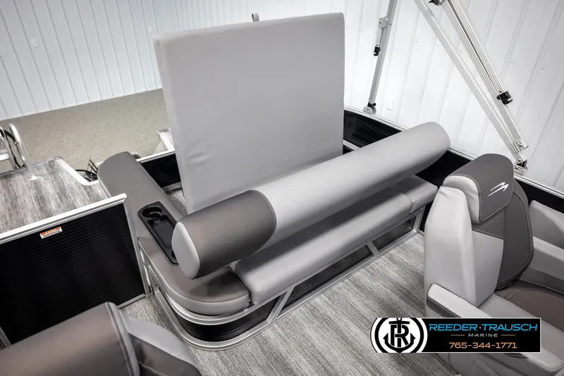 Slide: The Image of 2025 Bennington 21 SSBSE pontoon boat interior with gray seating and modern design. - 23