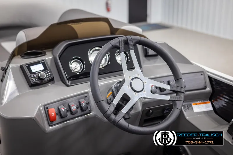 Slide: The Image of Steering console of 2025 Bennington 21 SSBSE boat with modern controls and dashboard. - 25