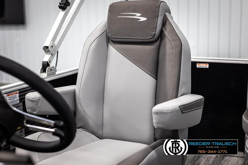Slide: The Image of Captain's chair in 2025 Bennington 21 SSBSE pontoon boat, featuring sleek gray upholstery. - 32