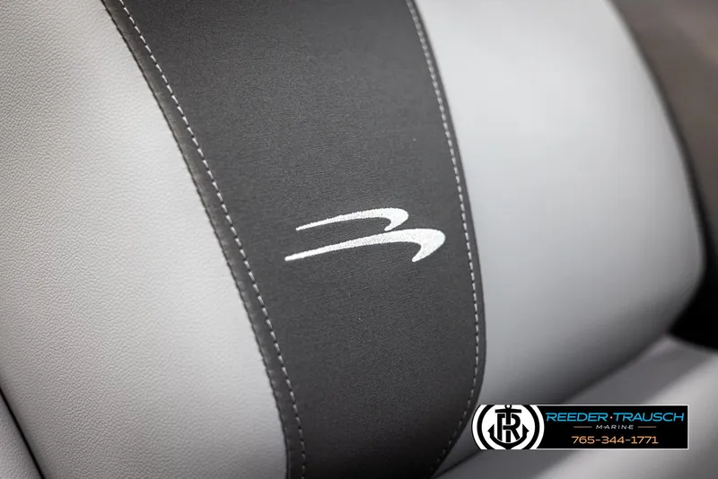 Slide: The Image of Close-up of 2025 Bennington 21 SSBSE boat seat with logo and stitching detail. - 36