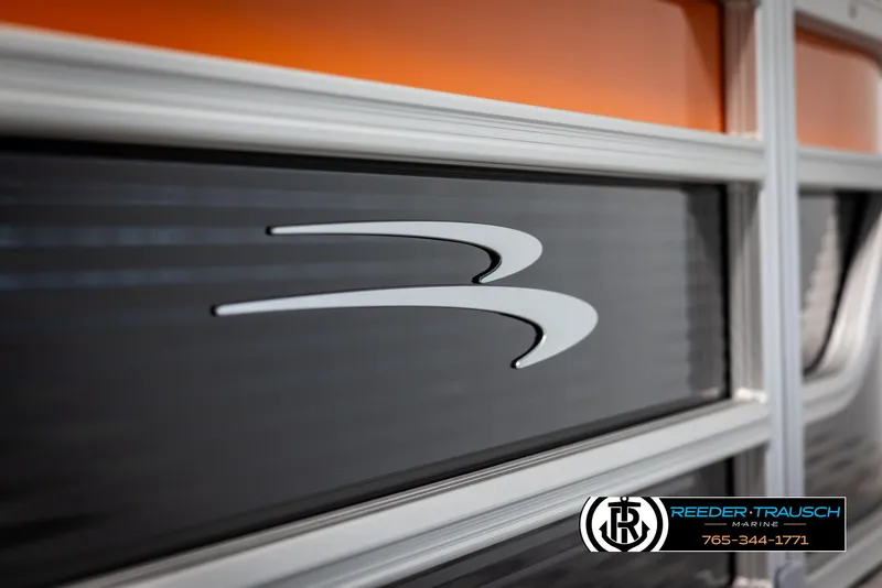 Slide: The Image of 2025 Bennington 21 SSBSE boat detail with logo and Reeder-Trausch Marine branding. - 45