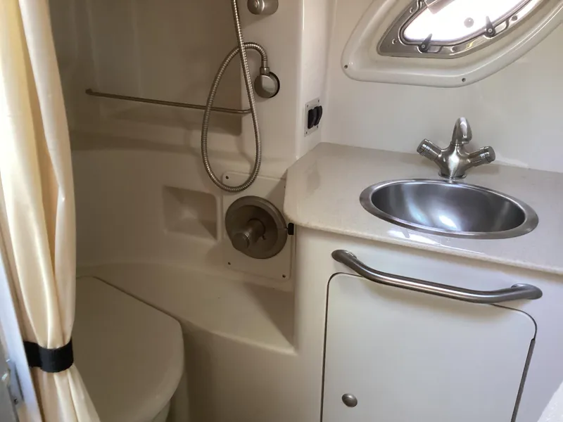 Slide: The Image of Compact bathroom in 2008 Sea Ray 350 Sundancer yacht with sink and shower. - 22