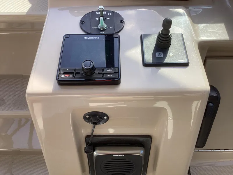 Slide: The Image of Control panel of a 2008 Sea Ray 350 Sundancer boat with navigation equipment. - 5