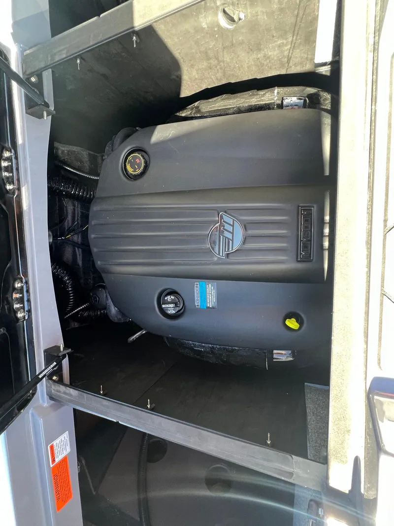 Slide: The Image of 2023 Malibu Wake Setter LSV 22 engine compartment, showcasing sleek design and advanced engineering. - 13