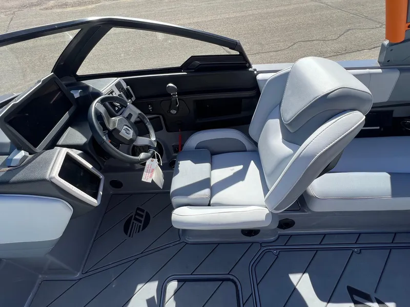 Slide: The Image of 2023 Malibu Wake Setter LSV 22 interior with sleek design and modern controls. - 17