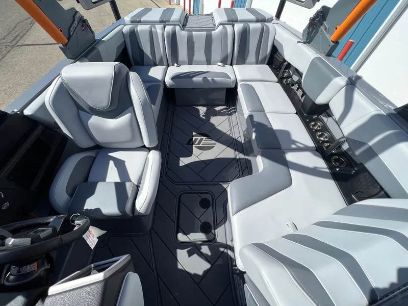 Slide: The Image of 2023 Malibu Wake Setter LSV 22 interior with gray seating and modern design. - 20
