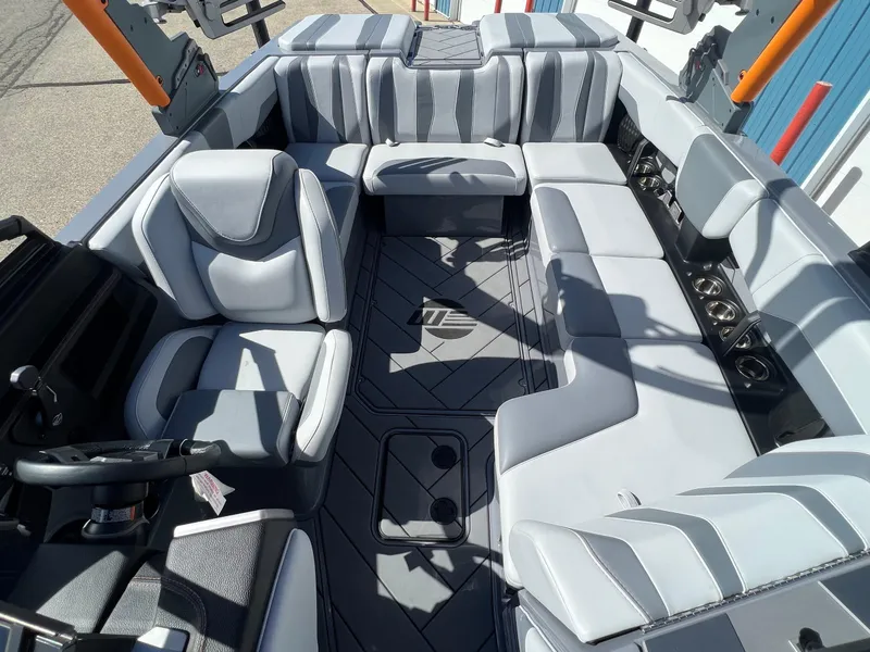 Slide: The Image of 2023 Malibu Wake Setter LSV 22 interior with luxurious seating and modern design. - 26