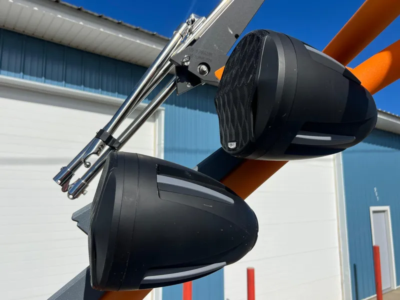 Slide: The Image of 2023 Malibu Wake Setter LSV 22 boat speakers mounted on a metal frame. - 30