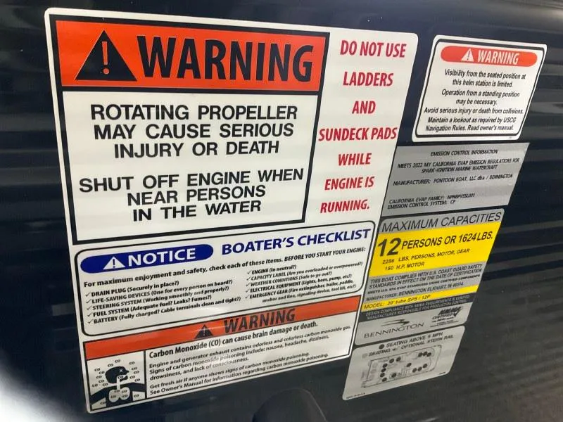 Slide: The Image of Warning labels on a 2023 Bennington 21LSB boat, highlighting safety precautions and capacity limits. - 15