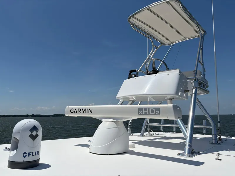 Slide: The Image of 2016 Invincible 42 Open Fisherman with Garmin and FLIR equipment on deck. - 11