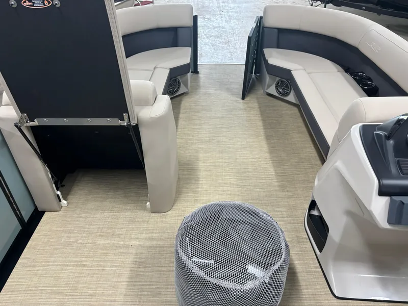 Slide: The Image of 2025 Harris Cruiser 230 interior with beige seating and modern design. - 4