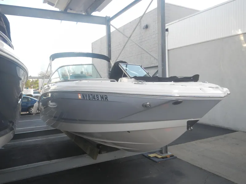 The Image of 2020 Chaparral 24 SSI boat in storage, side view. - 0