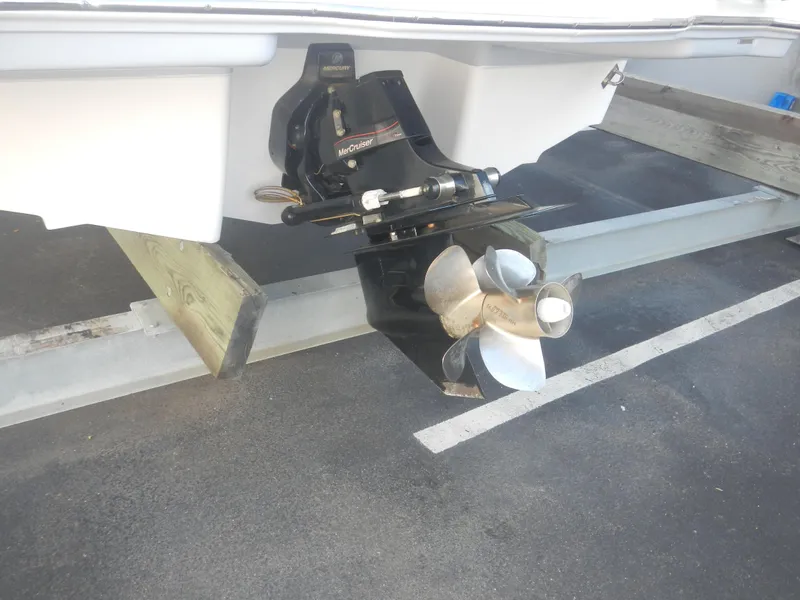 Slide: The Image of Stern drive of a 2020 Chaparral 24 SSI boat on a trailer. - 17