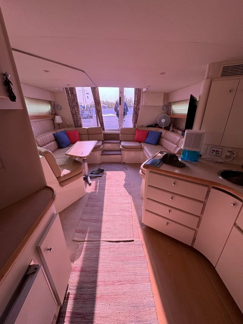 Slide: The Image of Interior of 1997 Carver 380 Santego SE yacht with cozy seating and modern amenities. - 37