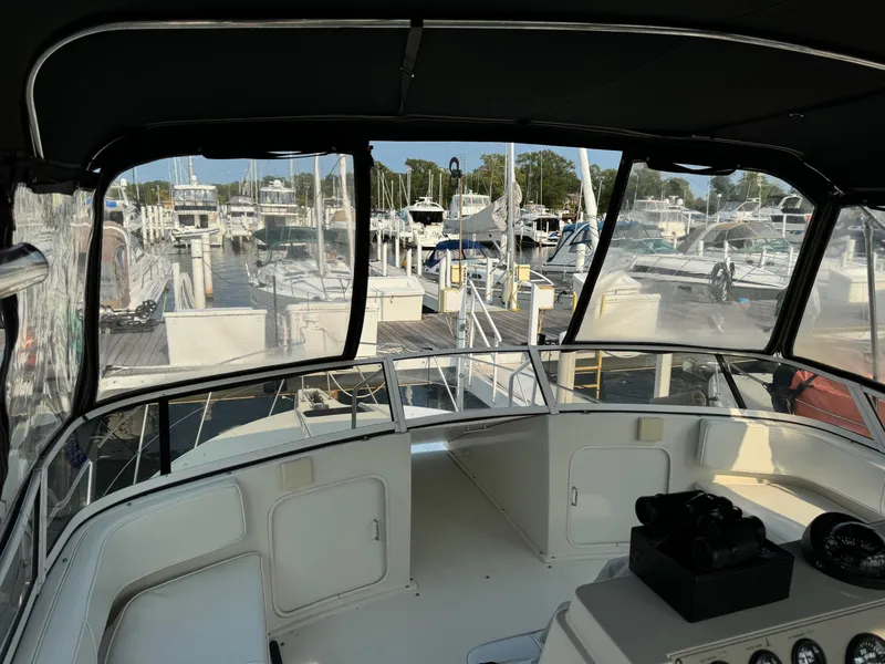 Slide: The Image of Interior view of 1997 Carver 380 Santego SE yacht at marina. - 12