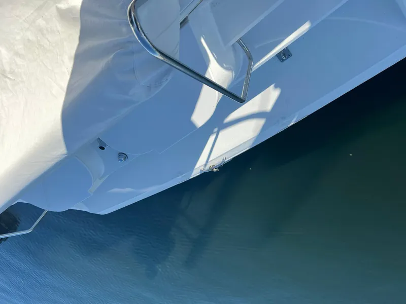 Slide: The Image of 1997 Carver 380 Santego SE yacht, partial view, docked on calm water. - 22