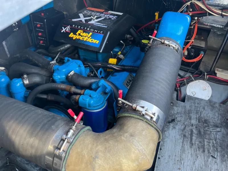 Slide: The Image of Engine compartment of a 1997 Carver 380 Santego SE with electronic fuel injection system. - 26