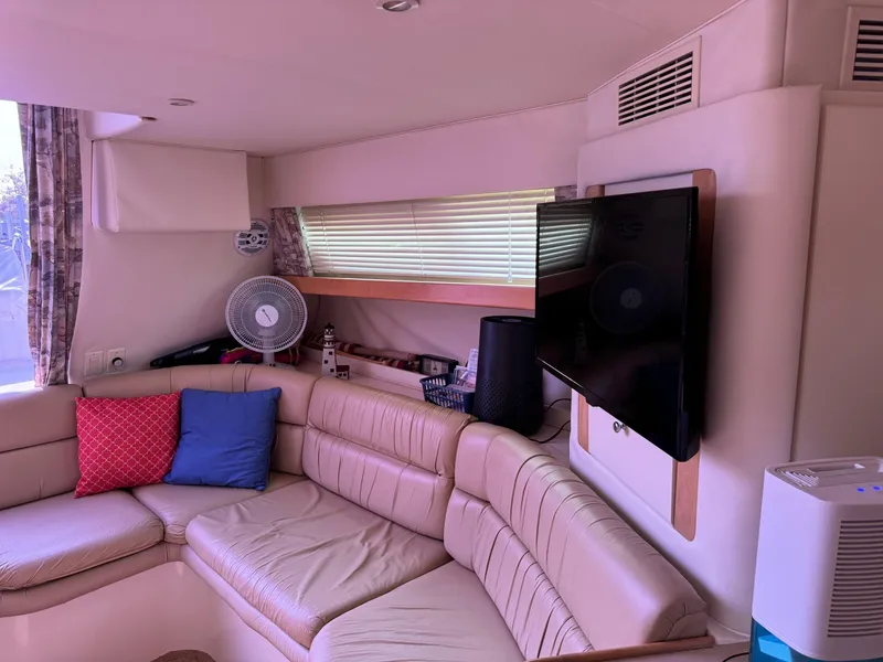 Slide: The Image of Interior of 1997 Carver 380 Santego SE yacht with leather seating and modern amenities. - 34