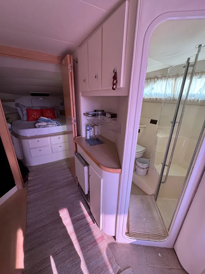 Slide: The Image of Interior of 1997 Carver 380 Santego SE yacht with bedroom and bathroom. - 35