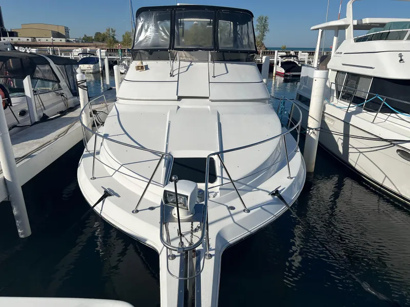 Slide: The Image of 1997 Carver 380 Santego SE yacht docked at marina. - 4
