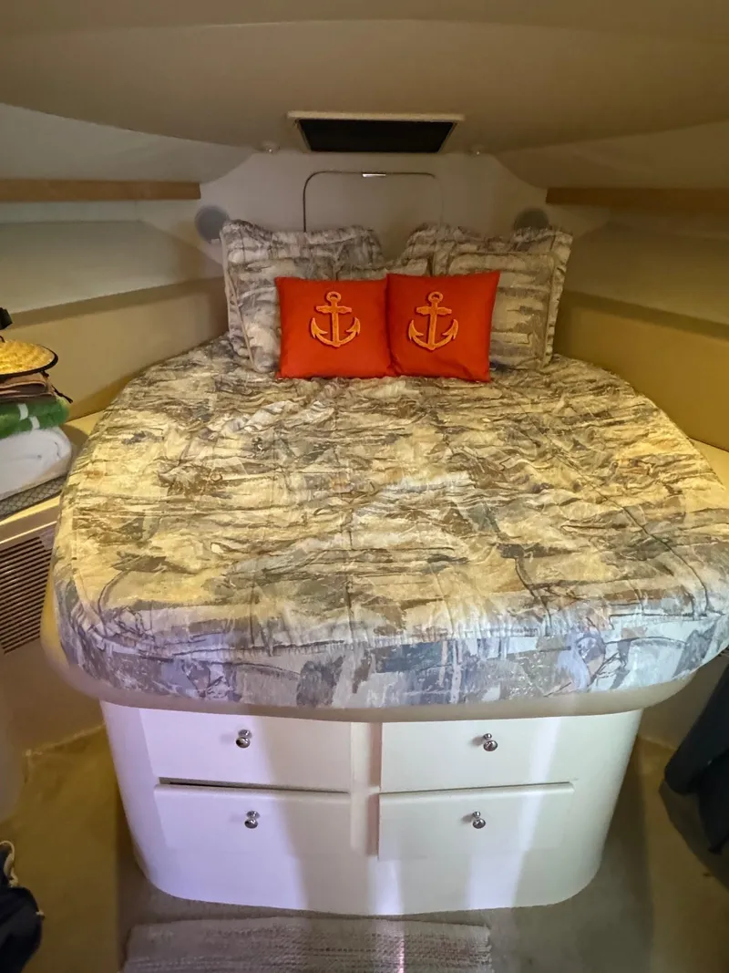 Slide: The Image of Cozy bedroom in 1997 Carver 380 Santego SE yacht with nautical-themed decor. - 41