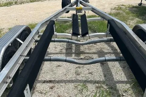 Slide: The Image of Boat trailer for 2022 Wellcraft 222 Fisherman, parked on gravel. - 11