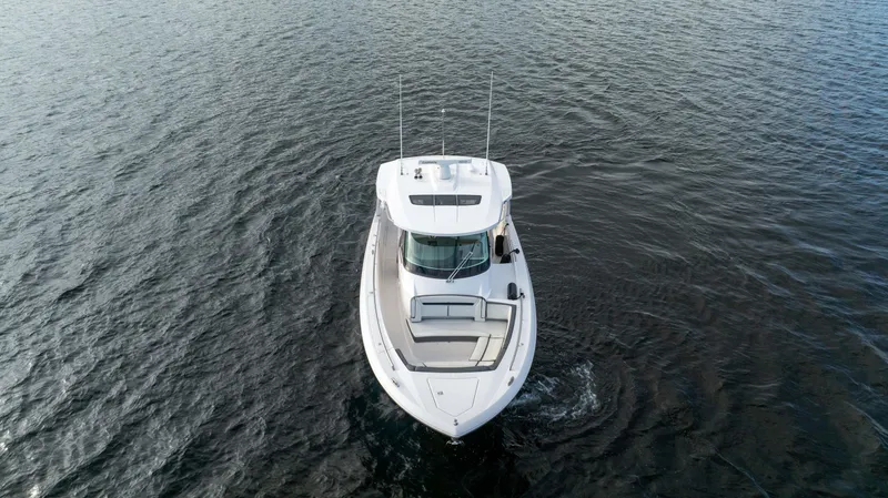 Slide: The Image of 2020 Tiara Sport 38 LS boat on open water, aerial view. - 10
