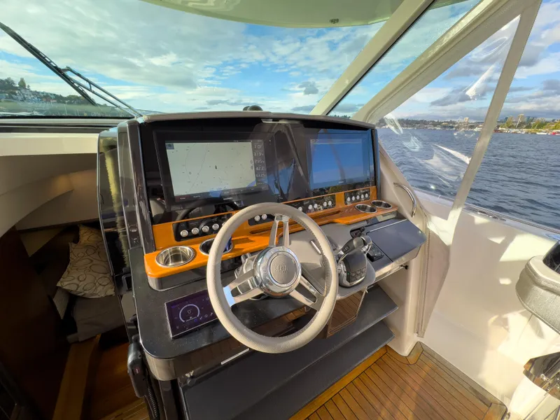 Slide: The Image of 2020 Tiara Sport 38 LS yacht helm with dual screens and steering wheel. - 28