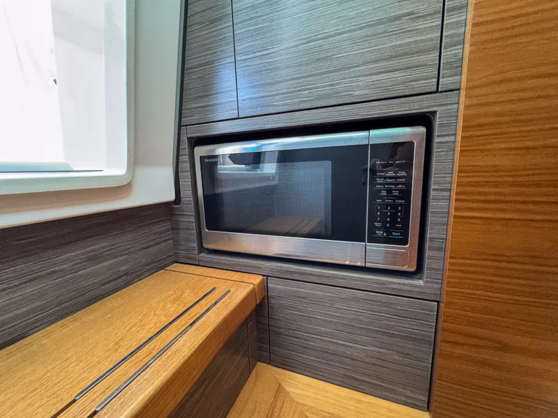 Slide: The Image of Built-in microwave in 2020 Tiara Sport 38 LS yacht interior. - 33