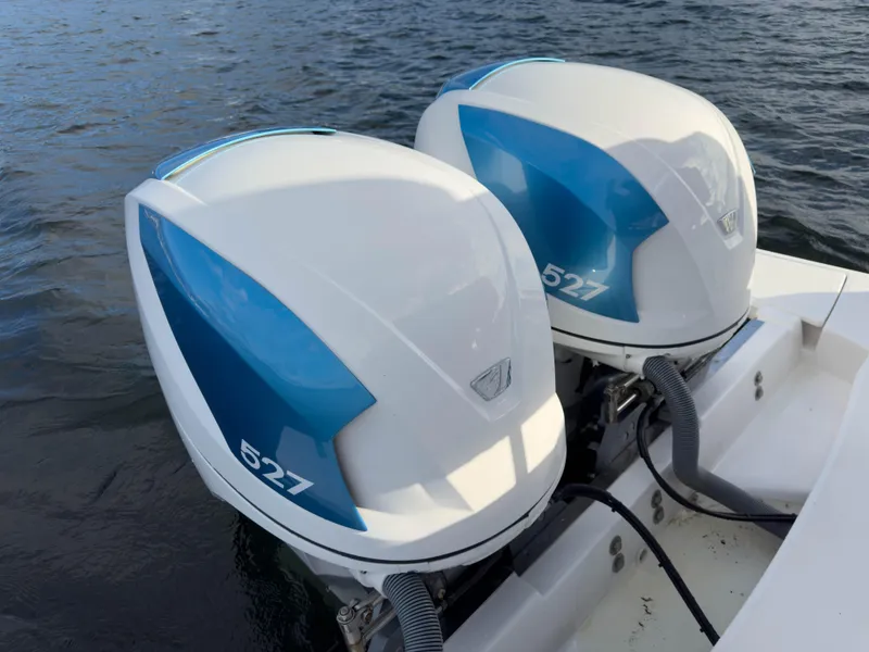 Slide: The Image of Twin 527 outboard engines on a 2020 Tiara Sport 38 LS boat. - 38