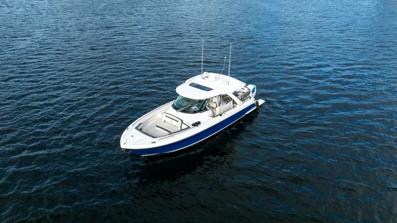 Slide: The Image of 2020 Tiara Sport 38 LS boat on open water. - 9