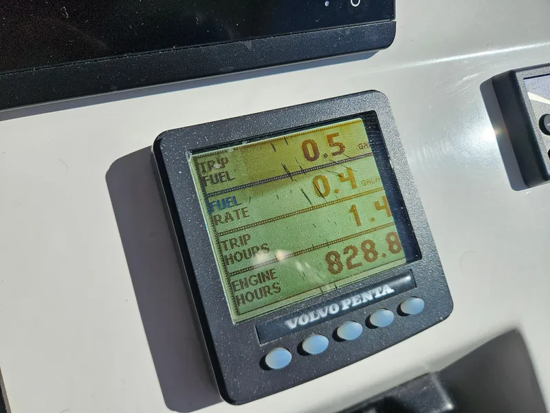 Slide: The Image of Volvo Penta display on 2008 Back Cove 33 showing fuel and engine hours. - 21