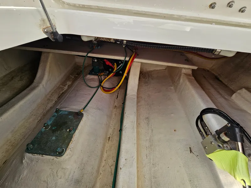 Slide: The Image of 2008 Back Cove 33 boat interior showing wiring and mechanical components. - 31