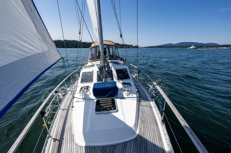 Slide: The Image of Sailing on a 2000 Nauticat 35 Pilot House yacht in open waters. - 7