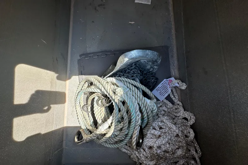 Slide: The Image of Coiled ropes and chains in a Kelsall 38ma boat storage compartment, 2019 model. - 53