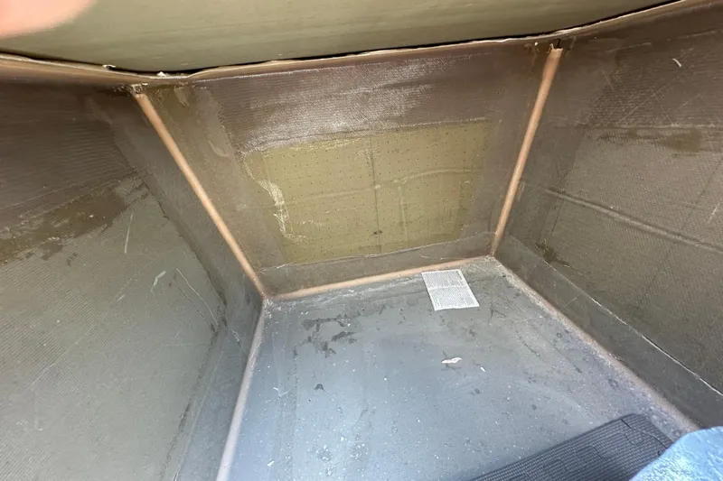 Slide: The Image of Interior view of a 2019 Kelsall 38ma boat compartment, showing fiberglass construction. - 54