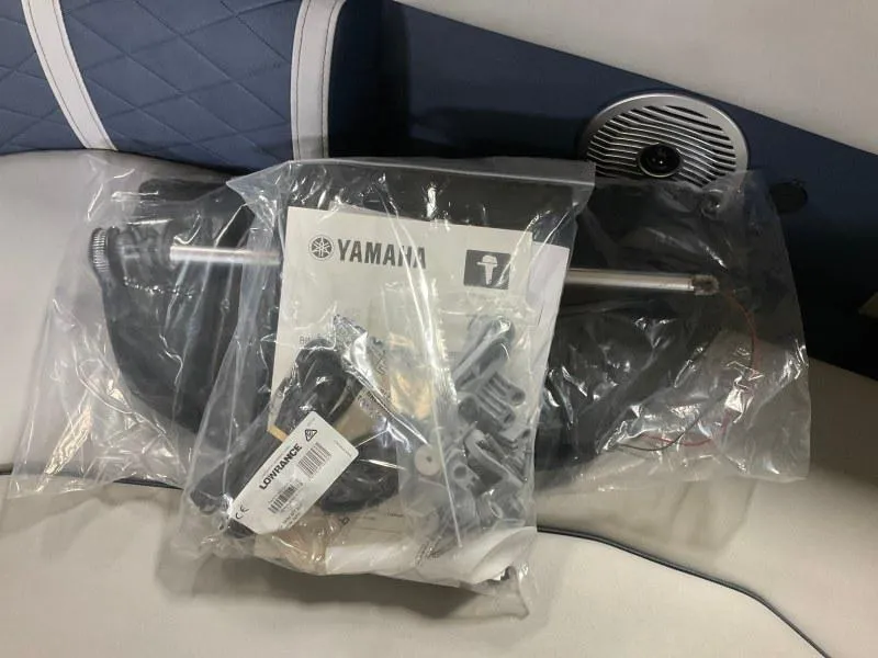 Slide: The Image of 2023 Bennington 23LTSB pontoon boat interior with plush seating and sleek design. - 12