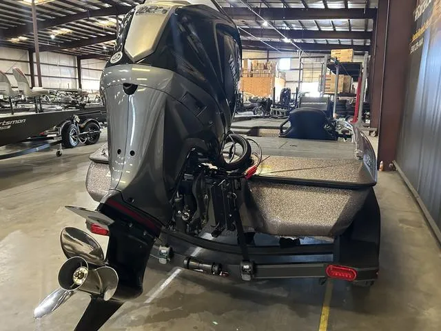 Slide: The Image of 2024 Skeeter ZXR 19 with Yamaha 225 SHO engine in a warehouse setting. - 4