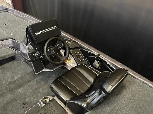 Slide: The Image of 2024 Skeeter ZXR 19 boat interior with Humminbird electronics and Yamaha 225 "SHO" controls. - 8