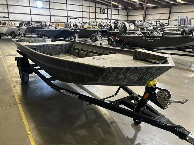 Slide: The Image of 2025 SeaArk 1648 Special boat on trailer in showroom, no motor. - 3