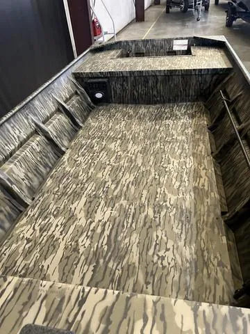 Slide: The Image of 2025 SeaArk 1648 Special boat interior with camouflage design, no motor included. - 8